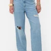 Rita Ora Ripped Dad Jeans